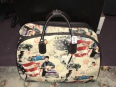 A large Elvis themed holdall/carry case