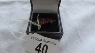 A 9ct gold Enamel pennant brooch marked Cowes.