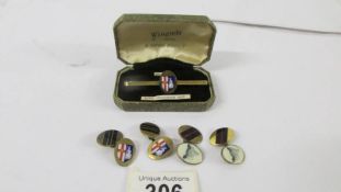 The Lincolnshire Regiment tie pin with two pairs of cuff links.