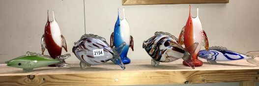 7 multicoloured art glass fish. Collect only.
