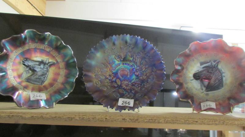 A carnival glass blue good look bowl by Northwood a/f and two Ducal amethyst pony bowls.
