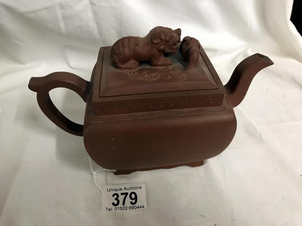 A Chinese earthenware teapot with dog of foo knob to lid. A/F - Image 12 of 12