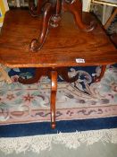A Victorian tip top side table on pedestal base. Collect only.