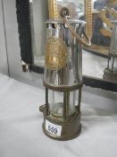 A mid 20th-century miner's lamp, complete.