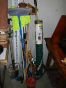 A mixed lot of garden tools, brooms etc., (Collect only).