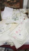 A nice lot of embroidered table linen.