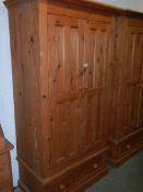 A pine double door wardrobe with single drawer. (Collect only).