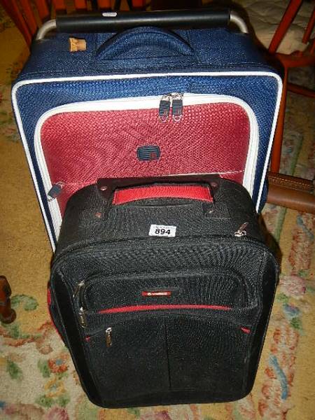 Two good suitcases. (Collect only).