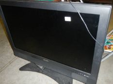 A Sharp 36 inch television. (Collect only).