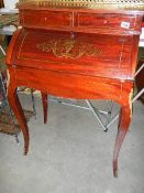 An early 20th century domed front ladies writing desk with brass inlay. (Collect only).
