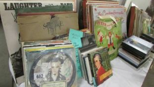 A mixed lot of LP's, 45 rpm recors, CD's and DVD's.