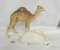 A Beswick camel (in good condition) and a Beswick pig (chip on ear).