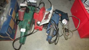 Two belt sanders, a planer and a drill. (Collect only).