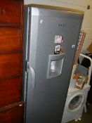 A tall Beko fridge with water dispenser. (Collect only).