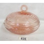 An unusual swirl pattern pink glass lidded bowl.