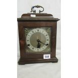 A mahogany chiming bracket clock.