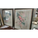 A pair of framed and glazed signed oriental floral studies. (Collect only).