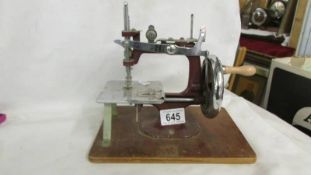 A vintage child's sewing machine.