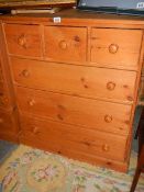 A three over three pine chest of drawers (Collect only).