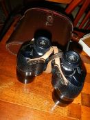 A cased pair of Ross London 15 x 40 binoculars.