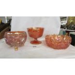 Three carnival glass marigold dishes.