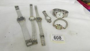 Four ladies and two gent's wrist watches.
