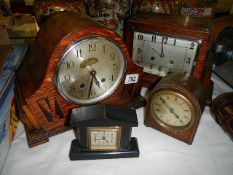 Four old clocks.