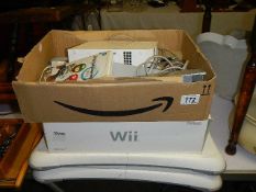 A Wii console and accessories. (Collect only).