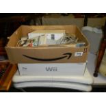 A Wii console and accessories. (Collect only).