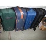 Four suitcases. (Collect only).