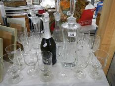 A mixed lot of decanters and glasses. (Collect only).