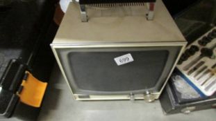 A vintage television. (Collect only).