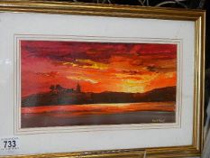 A Roberto Luigi Valente framed and glazed watercolour of a sunset landscape. (Collect only).