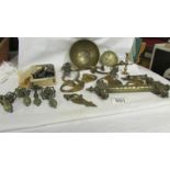 A mixed lot of brass hooks, cabinet handles etc.,