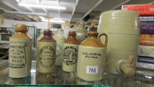 A stoneware barrel and a number of stoneware ginger beer bottles. (Collect only).