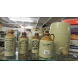 A stoneware barrel and a number of stoneware ginger beer bottles. (Collect only).