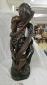 A good quality carved hardwood figure, 55 cm tall.