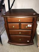 A dark wood stained lounge chest of drawers, magazine rack, side table and pot stand 36.5 x 42.5 x