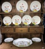 A quantity of Crown Ducal poppy platters & plates