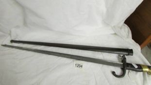 A Bayonet in sheath marked 54065?