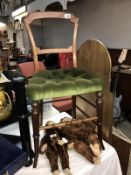An Edwardian mahogany bedroom chair with green Draylon and deep buttoned seat