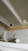 A pair of heavy brass table lamps (missing one shade).