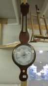 A mahogany banjo barometer.