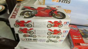 4 Tamiya 1/12 scale motorcycle model kits, 2 Ducatti, 1 Hamond, 1 Yamaha, 1 started, other 3 sealed.