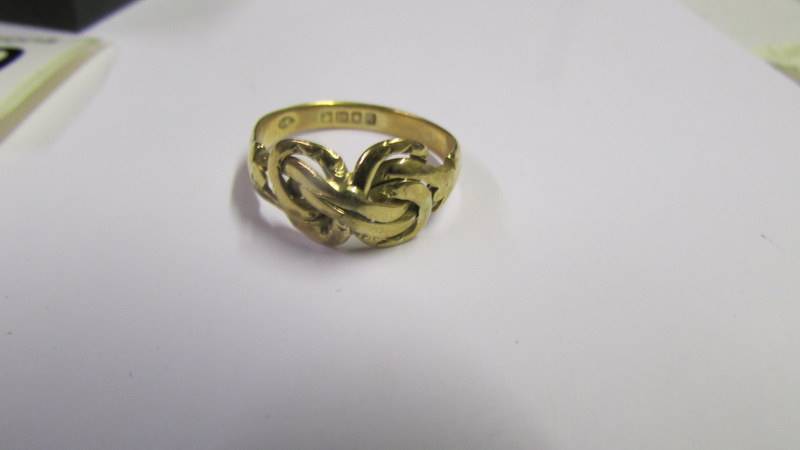 An 18ct gold rope twist ring, size P half, 4.4 grams.