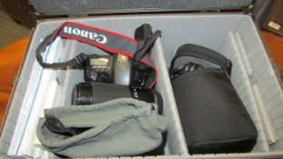 A Canon EOS 20D camera, lenses including EX Sigman 105mm 1-2.8 RMC and other accessories.