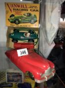 A Marx fire chief car and a boxed Empire made Vanwall racing car, battery operated