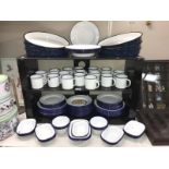 A large quantity of blue and white Falcon enamel dinner ware including mugs, plates etc.