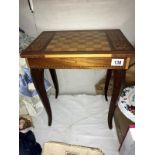 An inlaid musical sewing table