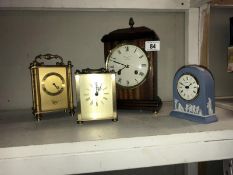 A Woodford mahogany 8 day mantle clock, Wedgwood blue Jasperware clock and 2 carriage clocks